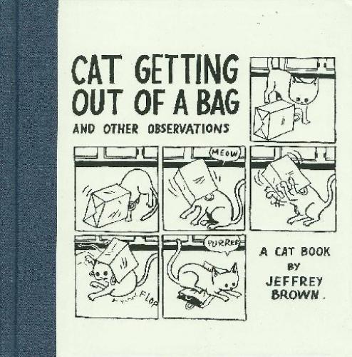 CAT GETTING OUT OF A BAG HC