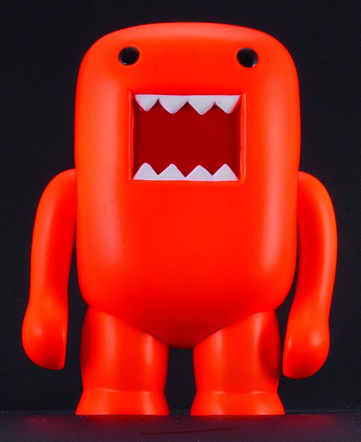 4 INCH DOMO VINYL FIGURE BLACK LIGHT ORANGE